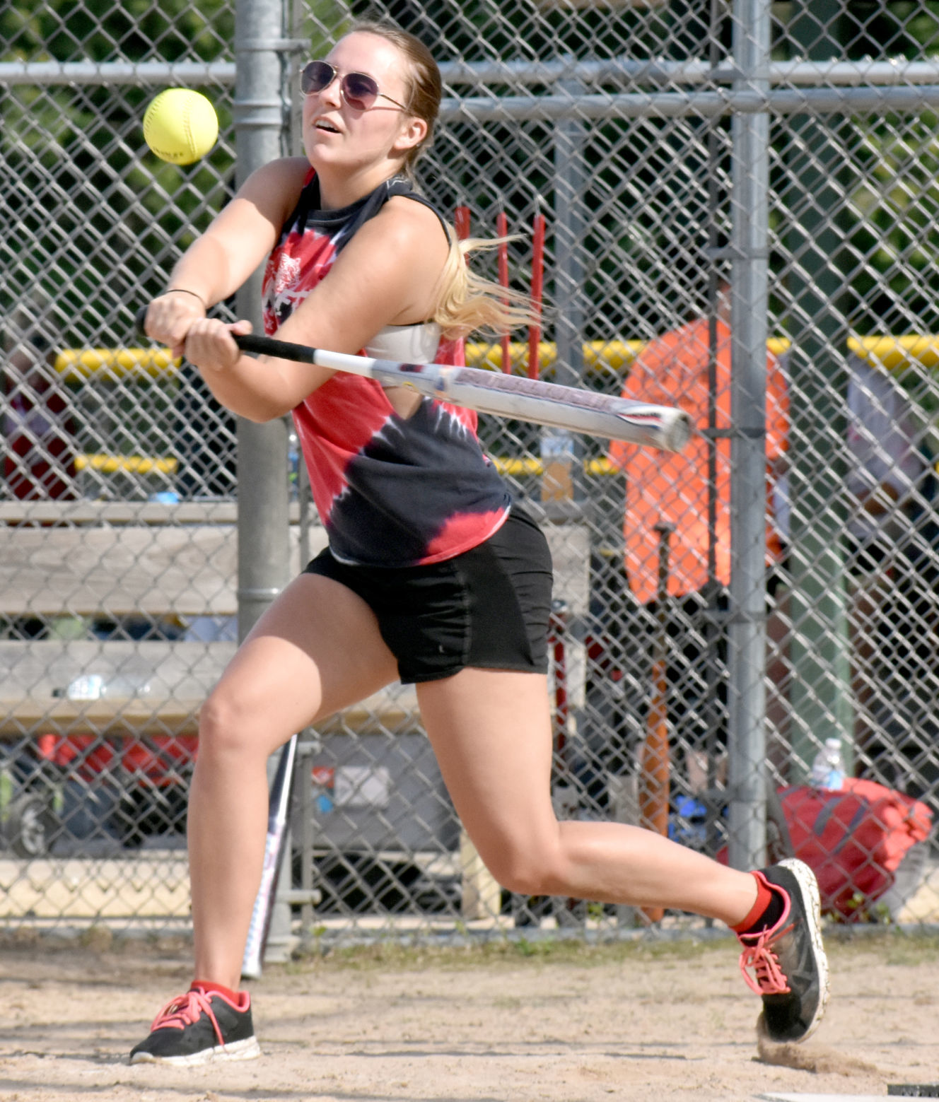 Marie Kallas hits softball